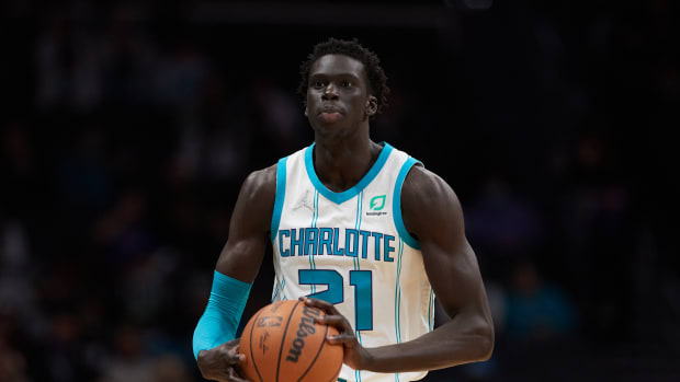 Jan 5, 2022; Charlotte, North Carolina, USA; Charlotte Hornets forward JT Thor (21) brings the ball up the court during fourth quarter action against the Detroit Pistons at Spectrum Center. Mandatory Credit: Brian Westerholt-USA TODAY Sports